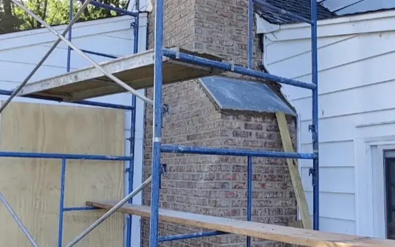 Chimney repair scaffold near Boston MA